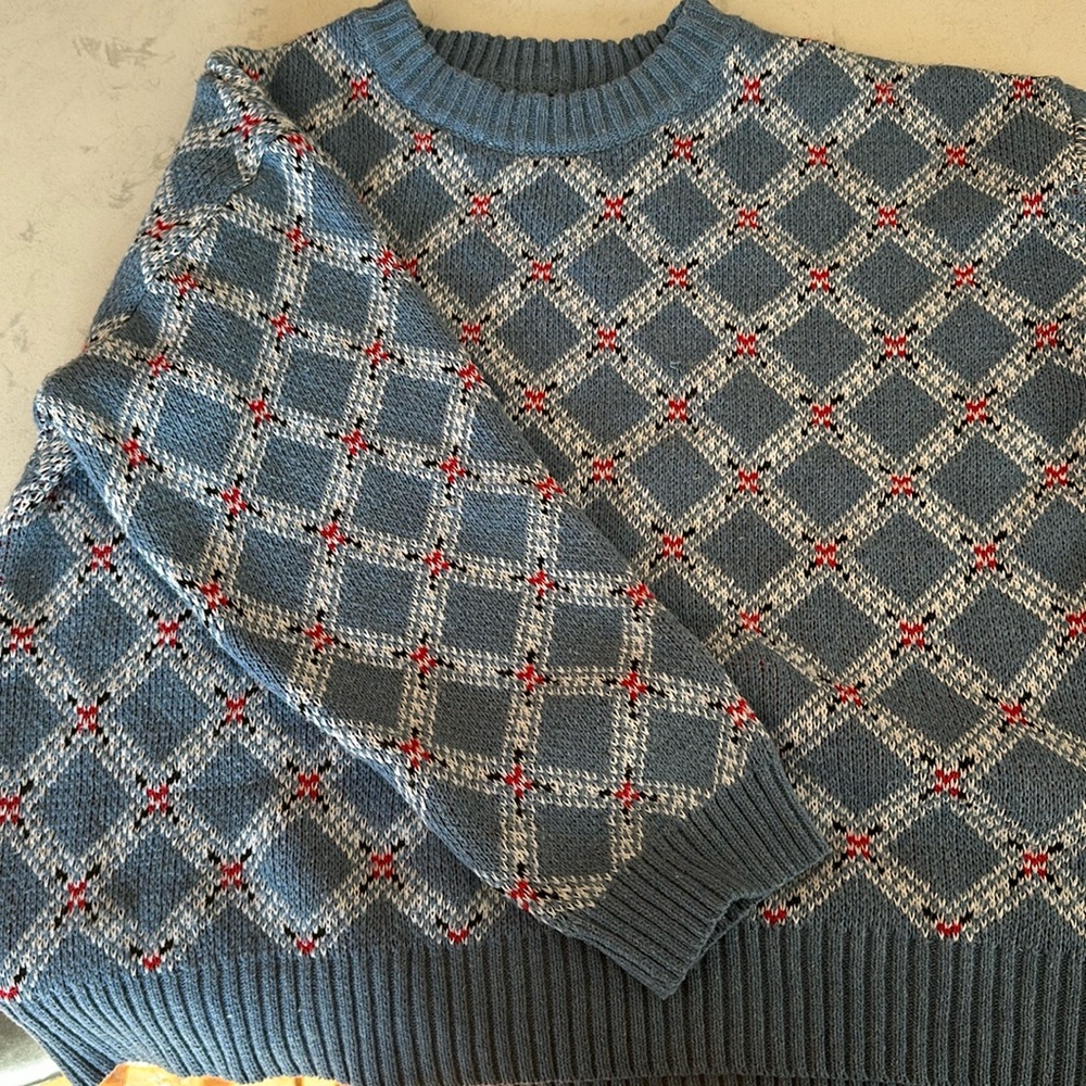 Blue Sweater with red black and white detailing